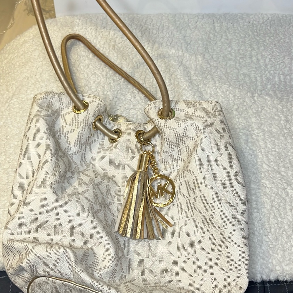 Michael Kors monogrammed beige gold hobo bag purse